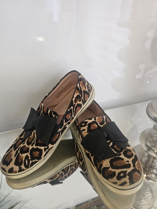 kate spade Shoes - kate spade Delise  Leopard Print Slip Ons  with Black Bow Accent